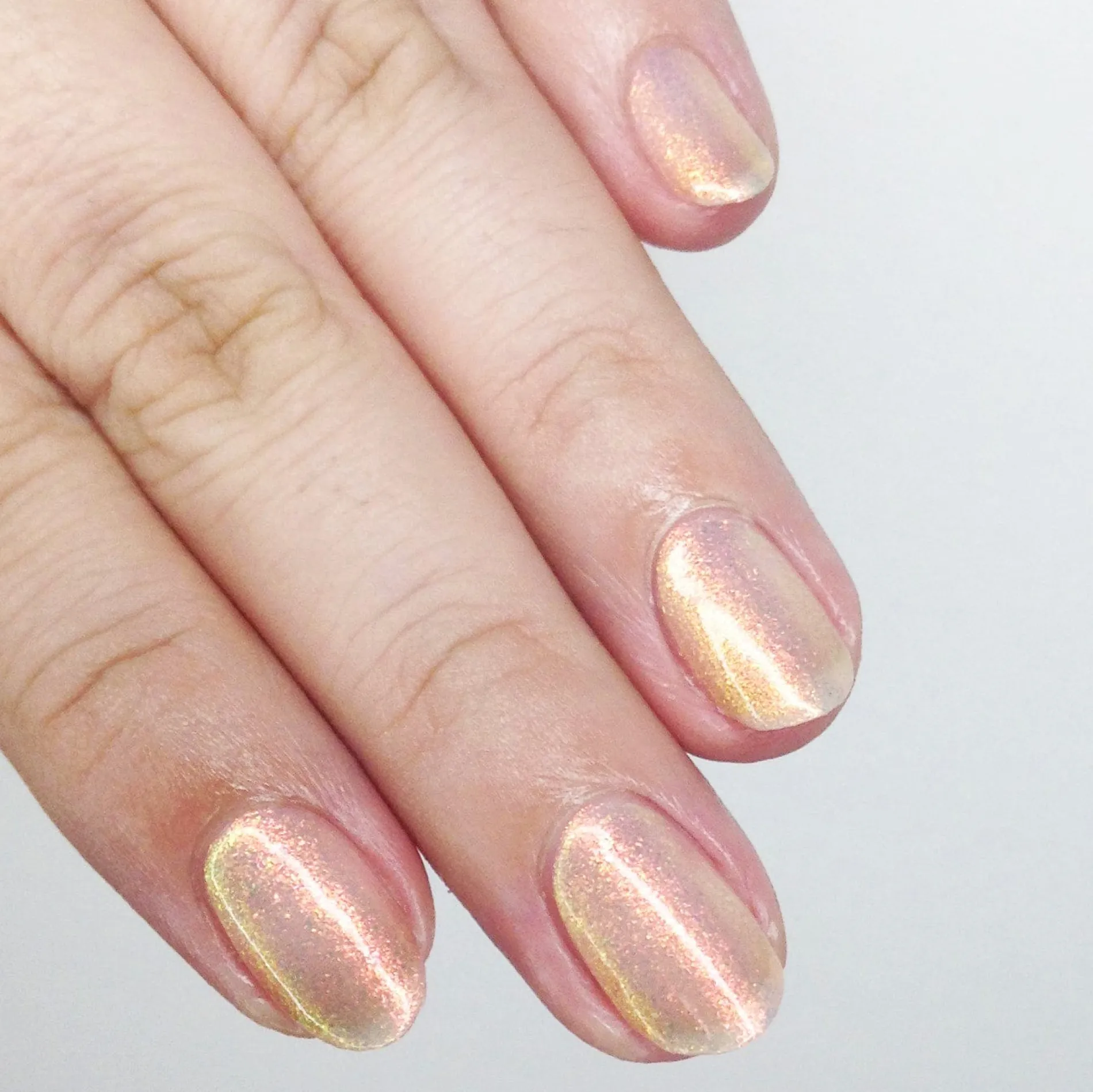 Pau Hana: Fuzzy Navel (P132) - Sheer Pink Flakie Nail Polish